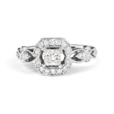 3/4 Ct. T.W. Diamond Halo Style and Woven Shank Engagement Ring in 14K White Gold