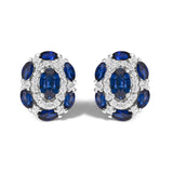 Aretes de botón estilo vintage con zafiro azul y diamantes en oro blanco de 14K