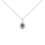Oval 6x4mm Green Emerald and Diamond Halo Pendant Necklace in 14K White Gold