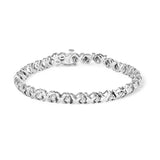 1 1/2 Ct. T.W. Diamond Alternating Diamond and X-Link Tennis Bracelet in 10K White Gold