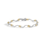 2 Ct. T.W. Diamond X and Wave Link Bracelet in 10K Two-Tone Gold