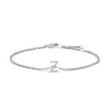 Pulsera de eslabones con dije de inicial A-Z con detalle de diamante en oro blanco de 10K