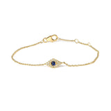 Pulsera de eslabones de estaciones de mal de ojo con zafiro azul y detalle de diamante en oro amarillo de 10K