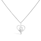 Collar con colgante de remolino y corazón calado Espira con diamantes de 0.03 ct. p.t. en oro blanco de 10K
