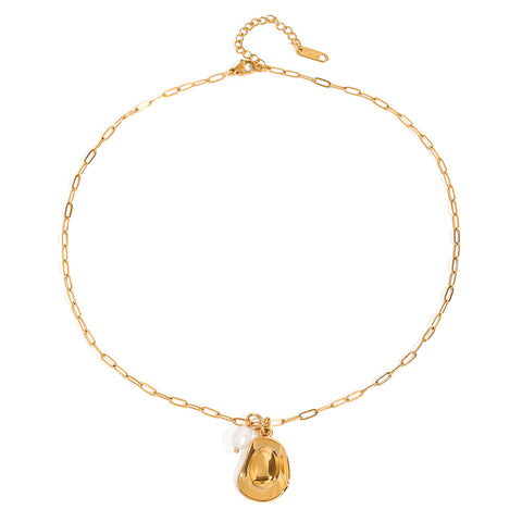 Gold tone charm necklace, 18K gold plated, on an elongated link chain with a polished pebble-shaped charm and a single pearl drop, lobster clasp and extender visible, no other stones visible.
