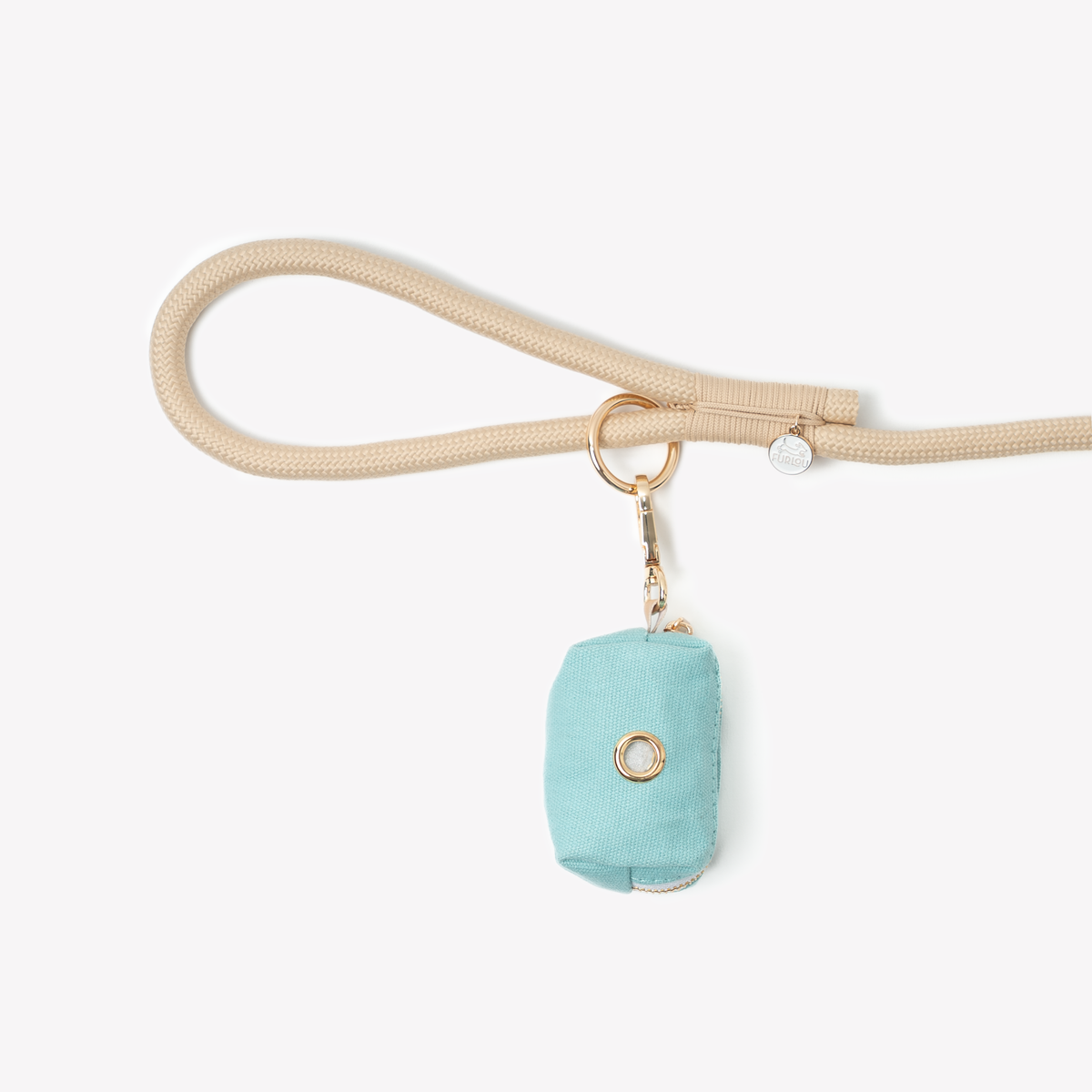 Blue poop bag holder clipped to a leash handle