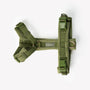 Green velvet dog harness laid flat
