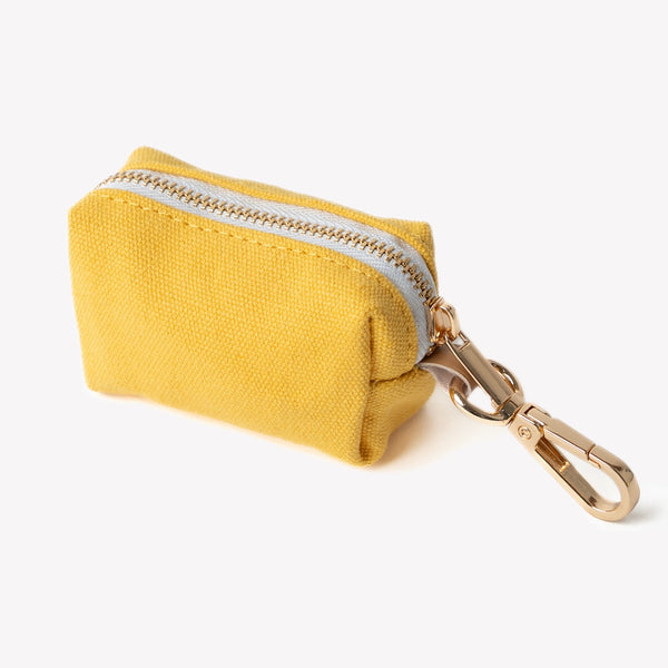 Yellow poop bag holder, zip pouch close-up