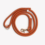 Terracotta braided rope leash, coiled