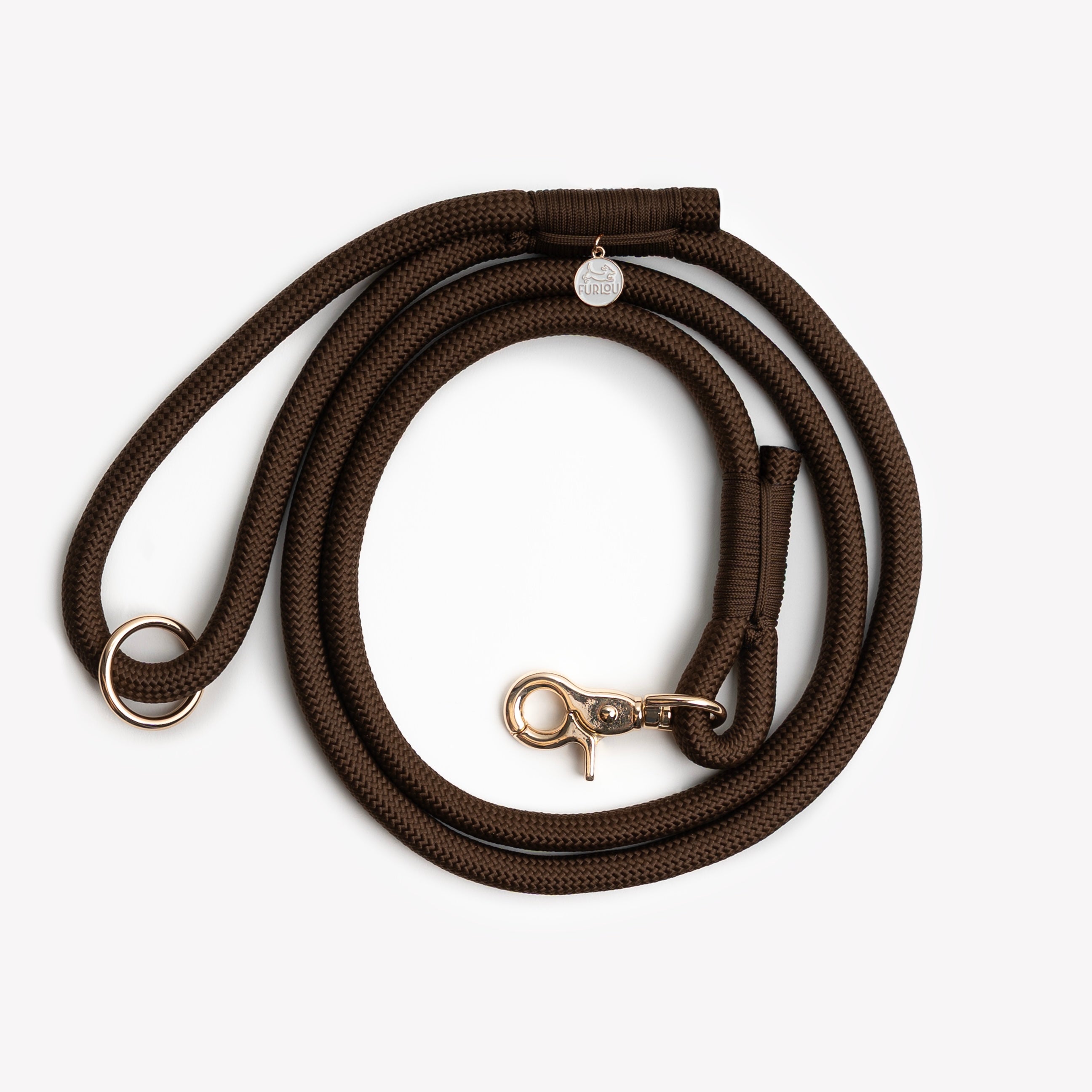 Brown braided rope leash, coiled