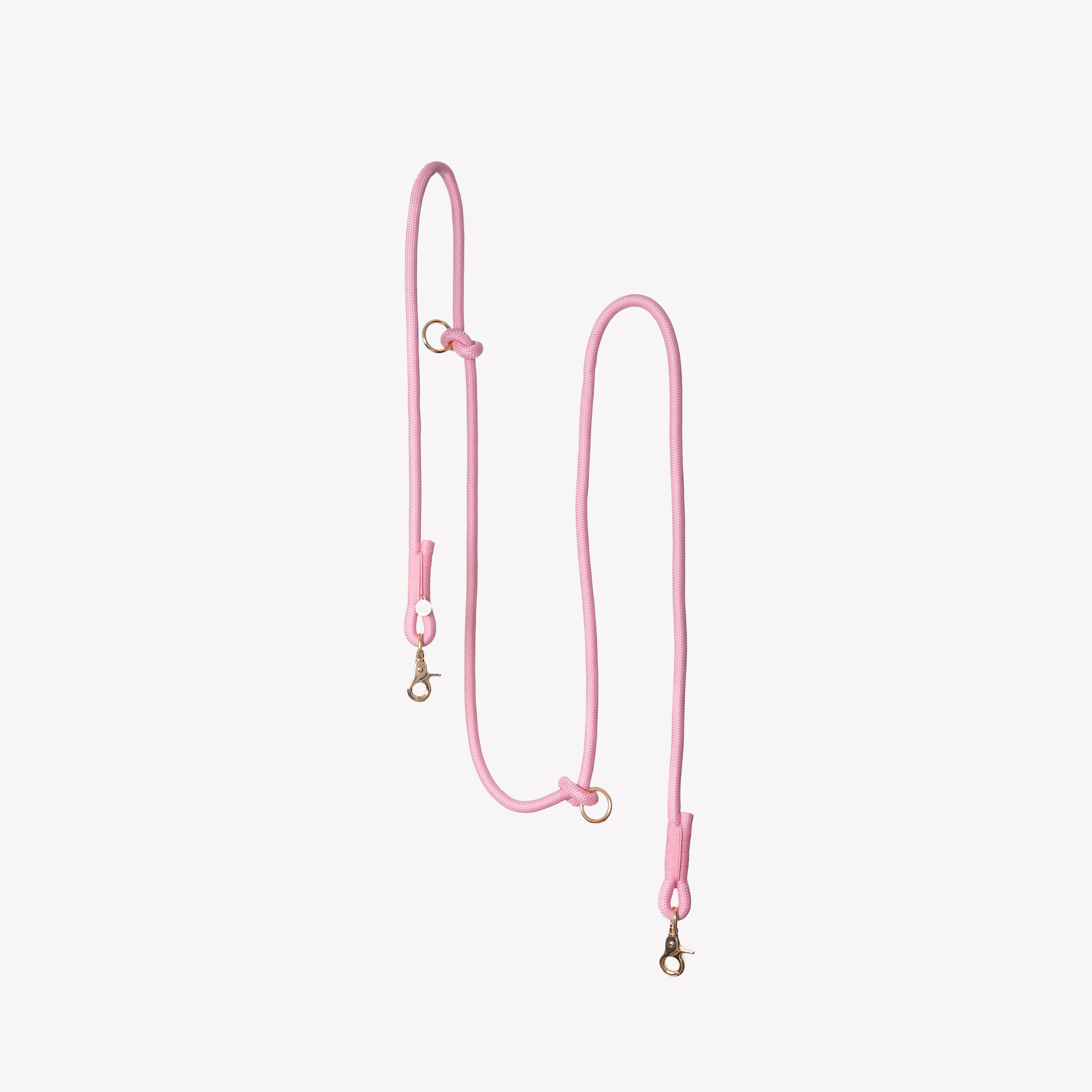 Pink hands-free braided leash at full length
