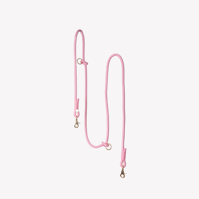 Pink hands-free braided leash at full length