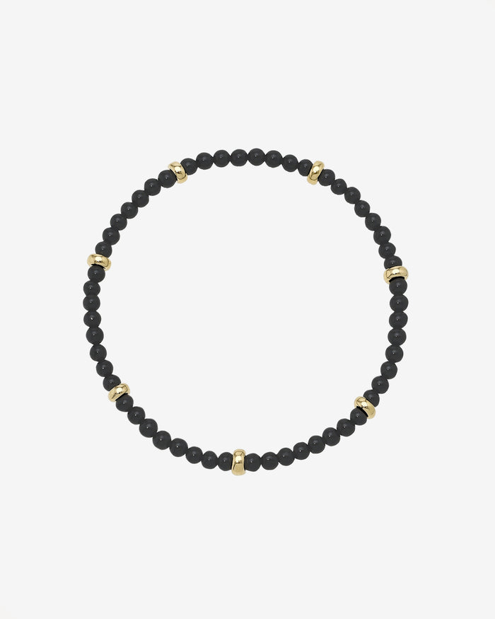 Pulsera de cuentas segmentada de ónix negro en oro de 14K, foto 1