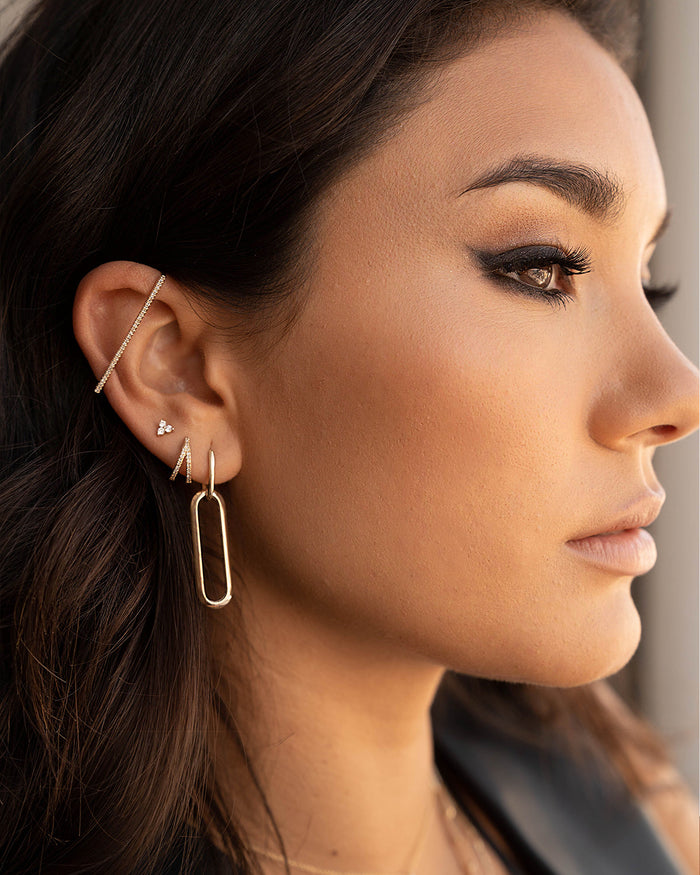 Aretes de aro huggie divididos con diamantes pavé en oro de 14K, foto 6