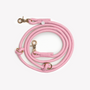 Pink hands-free braided leash, coiled