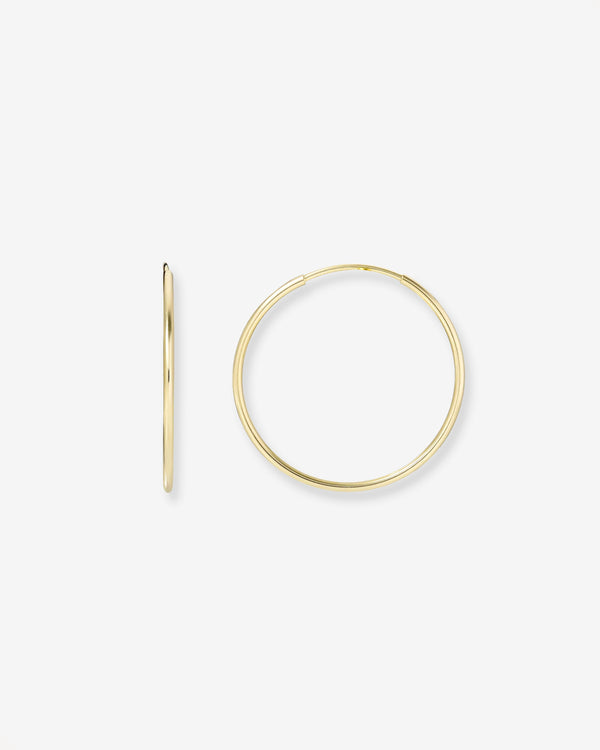 Aretes de aro de hilo medianos en oro de 14K, foto 1
