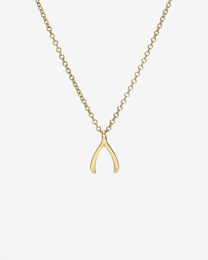 Collar infantil con mini hueso de la suerte en oro de 14K, foto 1
