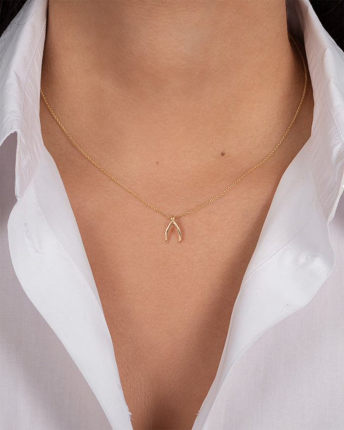 Dije de hueso de la suerte mini en oro de 14K, foto 2