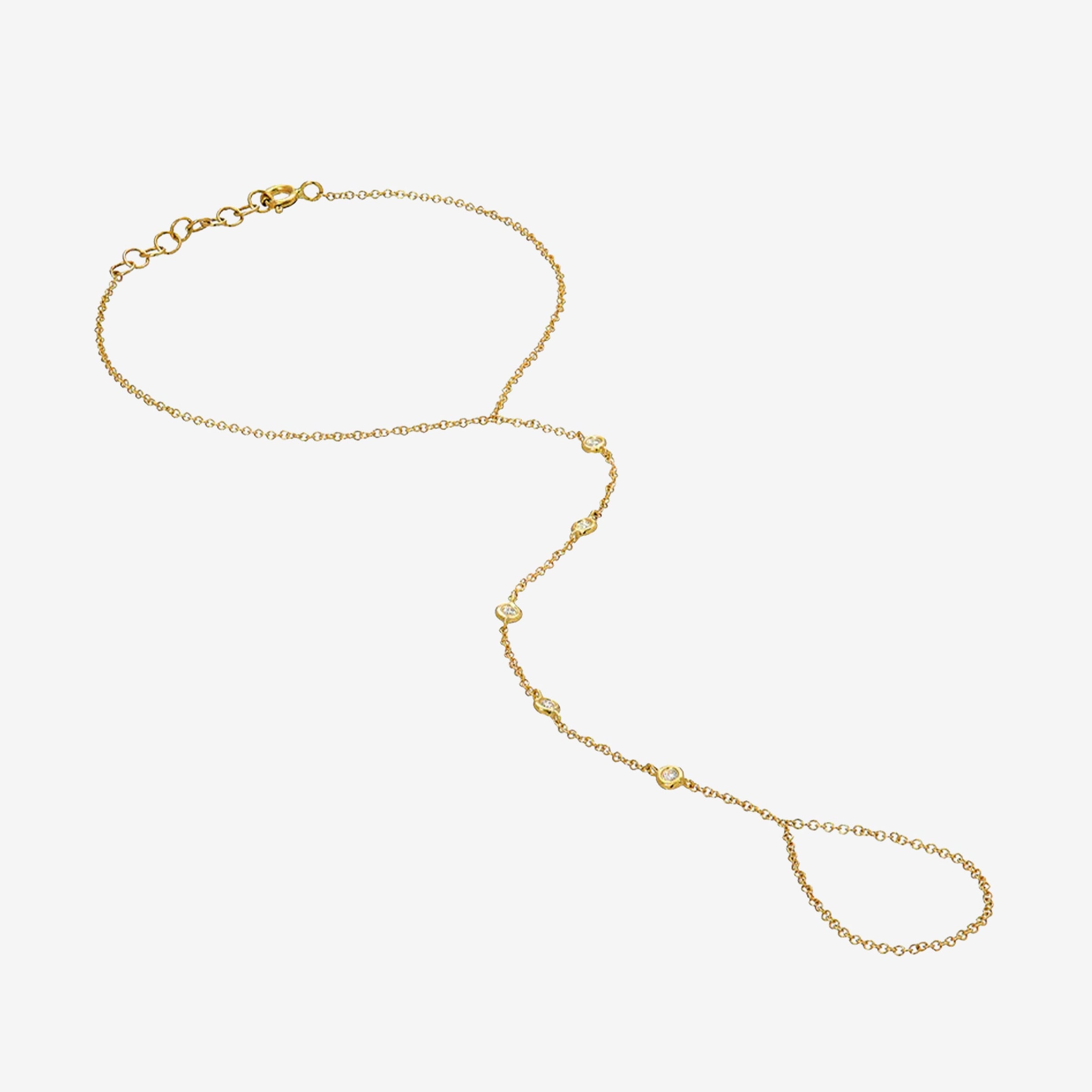 Cadena de mano con varios diamantes en bisel en oro de 14K, foto 1