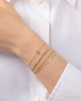 Pulsera de símbolo de la paz diminuto en oro de 14K, foto 5