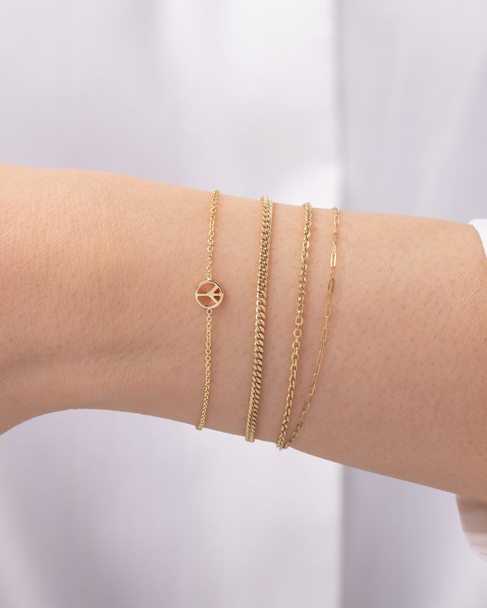 Pulsera de símbolo de la paz diminuto en oro de 14K, foto 2