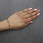 Pulsera de estaciones de halo con amatista morada y diamantes de 1/3 ct. p.t. en oro amarillo de 18K, foto 3