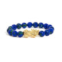 Pulsera con cuentas de azurita y dije de dragón en oro amarillo de 18K, foto 1