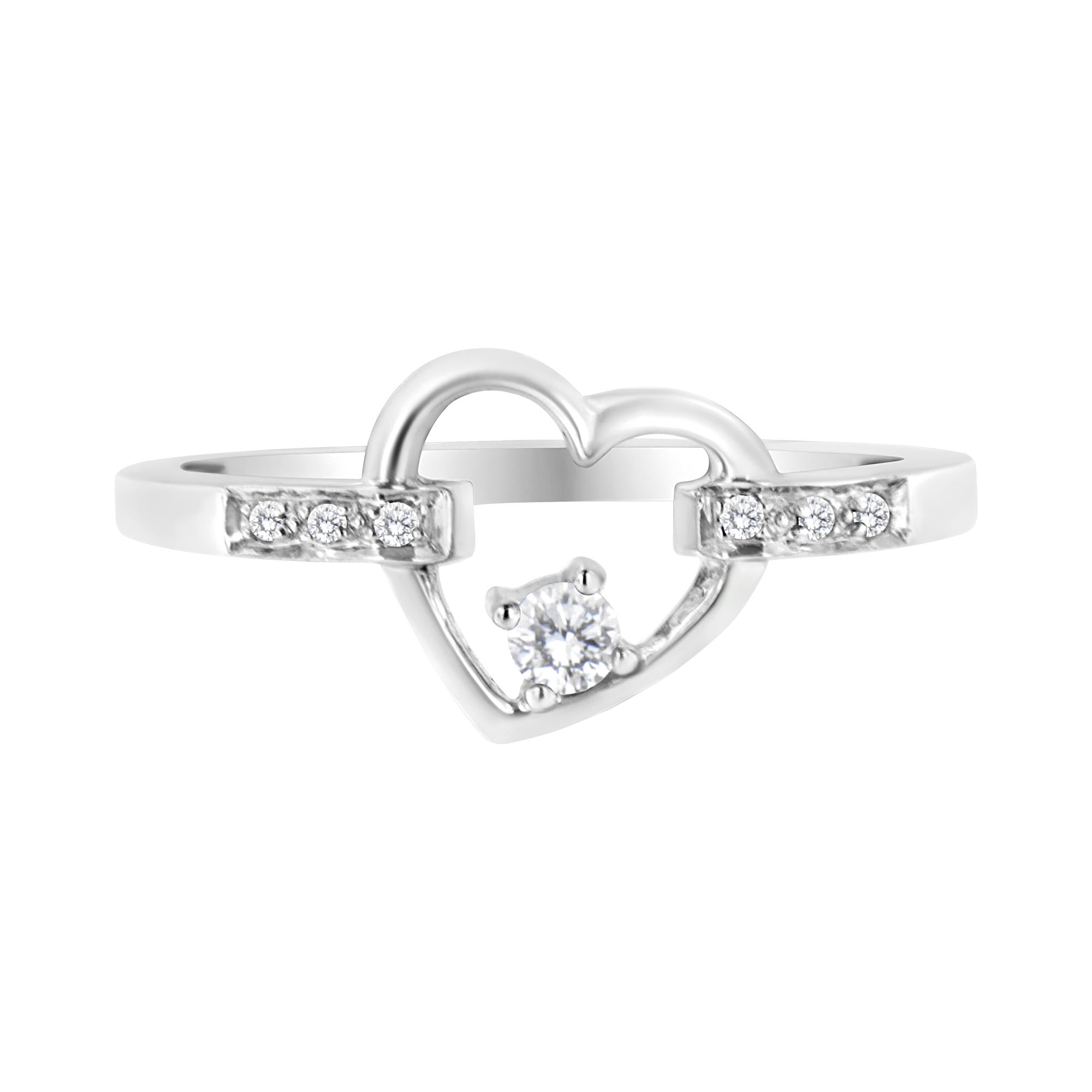 Anillo de corazón con engaste de canal y diamantes talla redonda de 1/8 ct. p.t. en oro blanco de 14K, foto 1