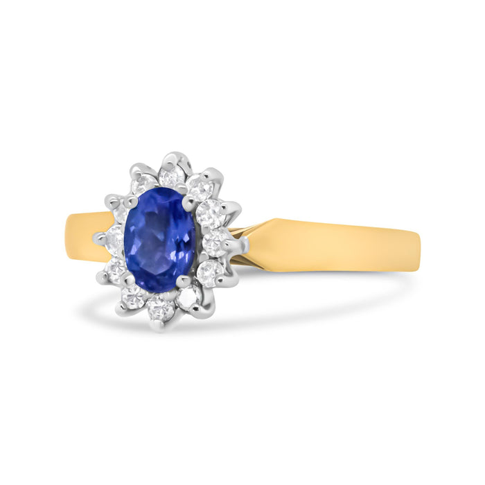Anillo de halo con diamantes redondos de 1/5 ct. p.t. y tanzanita azul ovalada de 6x4mm en oro amarillo de 14K, color H-I, claridad I1-I2, foto 2
