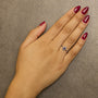 Anillo de halo con piedra natal ovalada de 5x3mm y detalle de diamante en oro blanco de 10K, foto 33