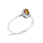 Anillo de halo con piedra natal ovalada de 5x3mm y detalle de diamante en oro blanco de 10K, foto 41
