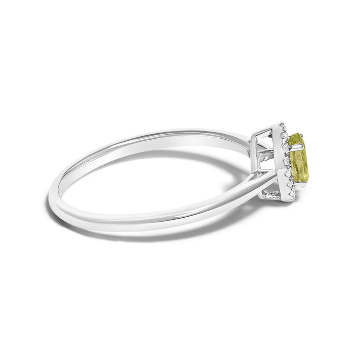 Anillo de halo con piedra natal ovalada de 5x3mm y detalle de diamante en oro blanco de 10K, foto 16