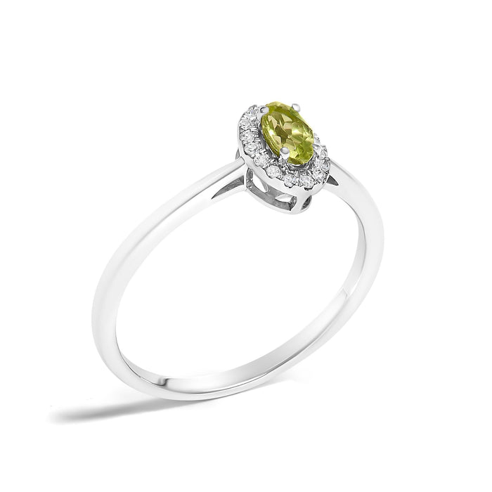 Anillo de halo con piedra natal ovalada de 5x3mm y detalle de diamante en oro blanco de 10K, foto 38