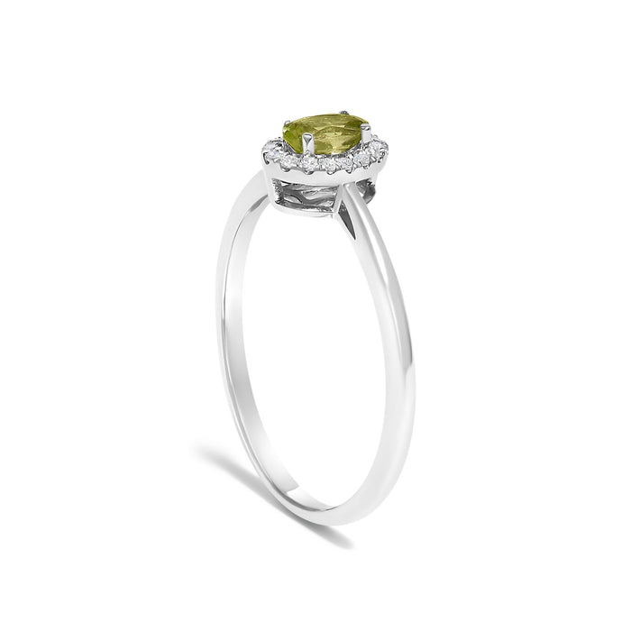 Anillo de halo con piedra natal ovalada de 5x3mm y detalle de diamante en oro blanco de 10K, foto 49