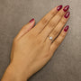 Anillo de halo con piedra natal ovalada de 5x3mm y detalle de diamante en oro blanco de 10K, foto 24
