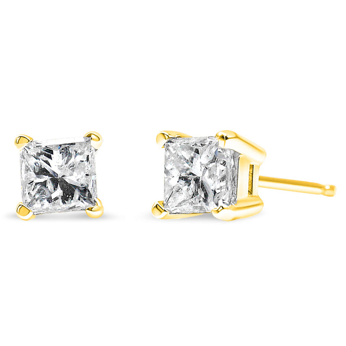 Aretes de botón solitarios clásicos de 4 garras con diamantes casi incoloros de 0.40 ct. p.t. en oro amarillo de 14K, foto 1