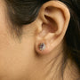 1/4 Ct. T.W. Diamond and Blue Purple Tanzanite Sunburst Halo Stud Earrings in 14K Yellow Gold, photo 3