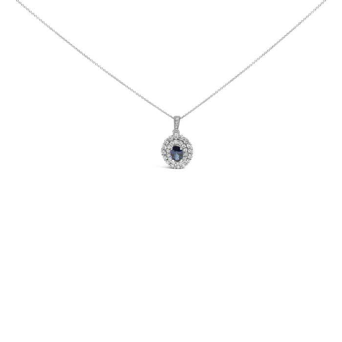Collar con colgante de halo con zafiro azul ovalado y diamantes de 3/4 ct. p.t. en oro blanco de 14K, foto 1