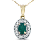 1/5 Ct. T.W. 6x4mm Emerald and Round Diamond Halo Pendant Necklace in 14K Yellow Gold