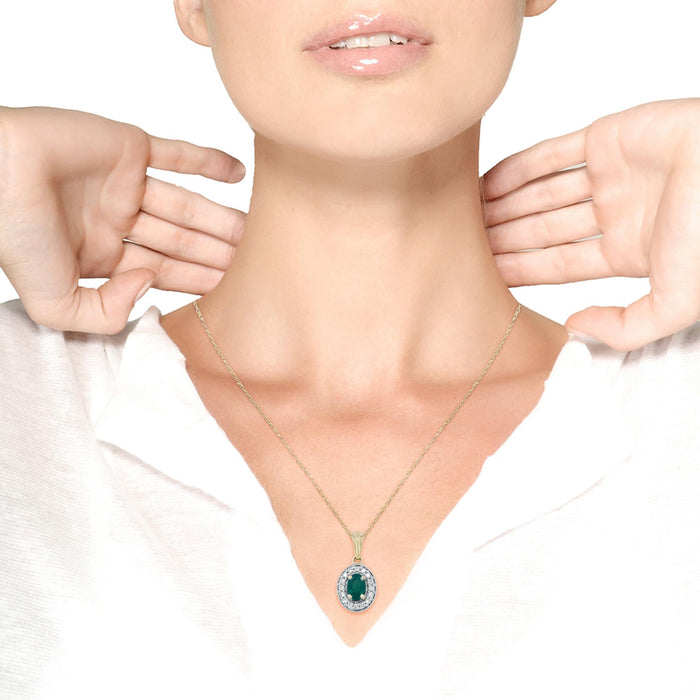 1/5 Ct. T.W. 6x4mm Emerald and Round Diamond Halo Pendant Necklace in 14K Yellow Gold, photo 3
