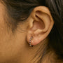 Alternating Diamond and Red Ruby Huggy Hoop Earrings in 10K Gold, photo 5