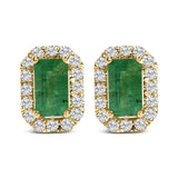 1/8 Ct. T.W. Green Emerald and Diamond Halo Octagonal-Shaped Stud Earrings in 14K Yellow Gold