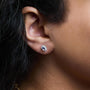 Aretes de botón de halo con piedra natal talla ovalada de 5x3mm y diamantes en oro blanco de 10K, foto 32