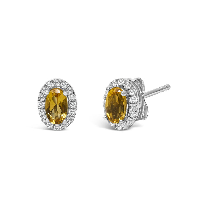 Aretes de botón de halo con piedra natal talla ovalada de 5x3mm y diamantes en oro blanco de 10K, foto 19
