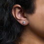 Aretes de botón de halo con piedra natal talla ovalada de 5x3mm y diamantes en oro blanco de 10K, foto 23