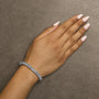 3 Ct. T.W. Princess-Cut Diamond Quad Invisible-Set Tennis Bracelet in 14K Gold, photo 5