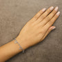 Pulsera de cadena de cable con dije de amor y diamantes de 1/6 ct. p.t. en oro blanco de 10K, foto 3