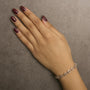 1/4 Ct. T.W. Diamond Infinity Loop and Swirl Link Bracelet in 10K Rose and White Gold, photo 3