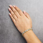 Pulsera tenis de eslabones de lazo y caja con diamantes princesa y baguette de 9 7/8 ct. p.t. en oro amarillo de 14K, color G-H, claridad VS1-VS2, 7 pulg., foto 3