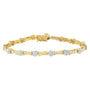 Pulsera de eslabones con diamantes redondos y talla baguette de 2 ct. p.t. en oro amarillo y blanco de 10K, foto 1